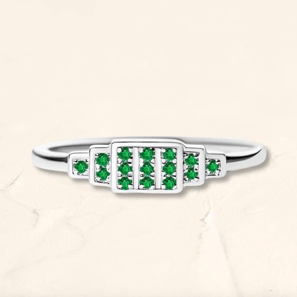 Anillo Brami en oro blanco con esmeraldas engastadas