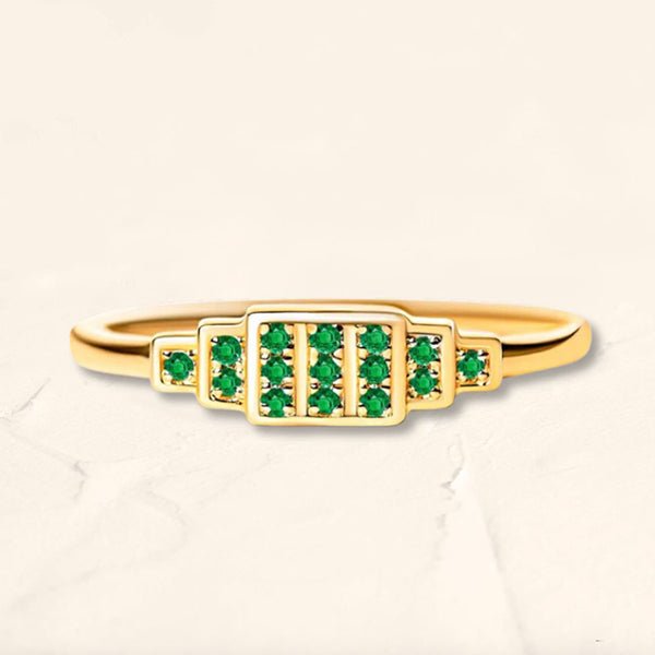 Anillo Brami en oro amarillo con esmeraldas engastadas