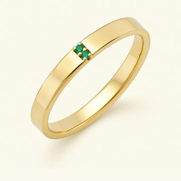 Alianza con esmeralda para hombre en oro amarillo