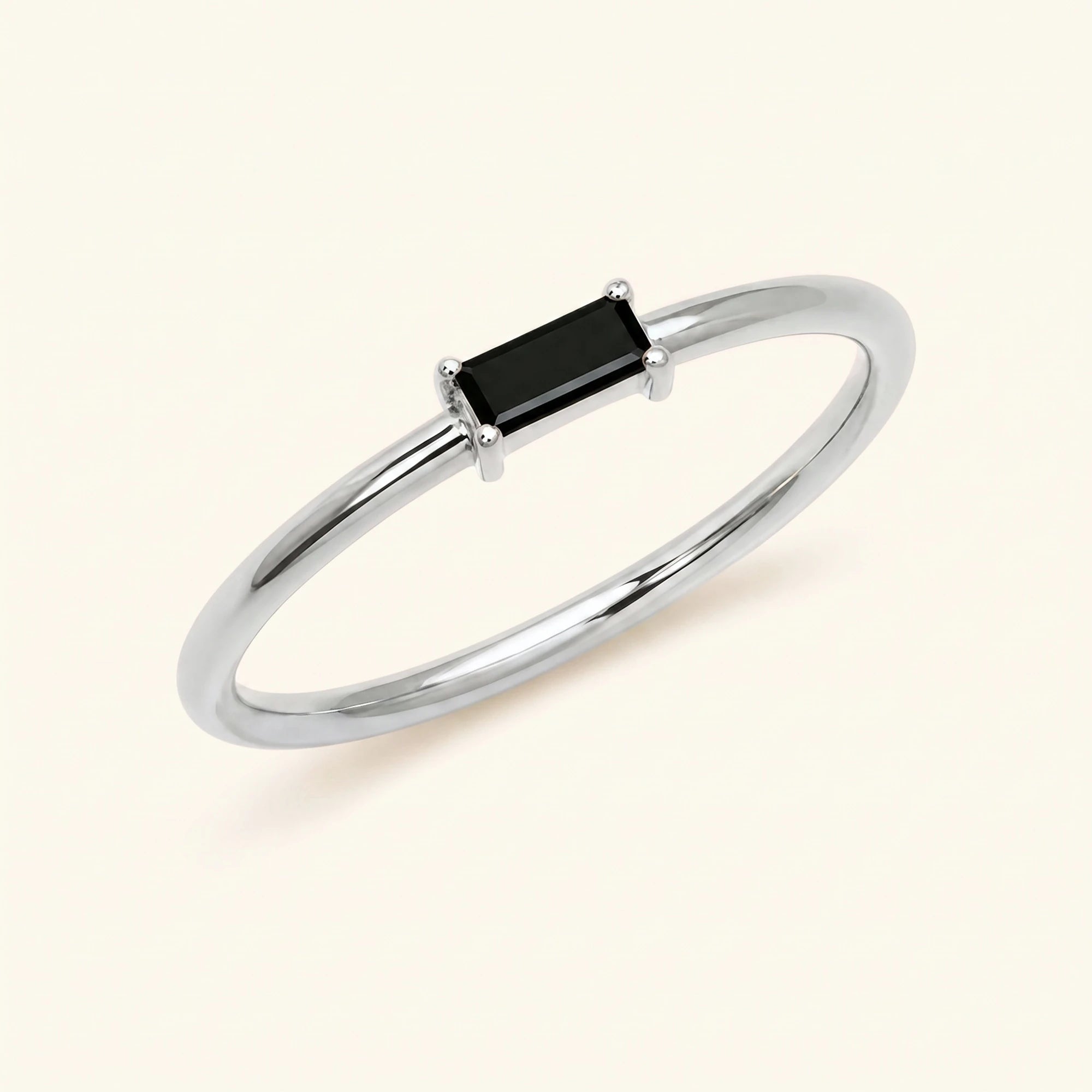 Anillo solitario diamante negro talla baguette oro blanco