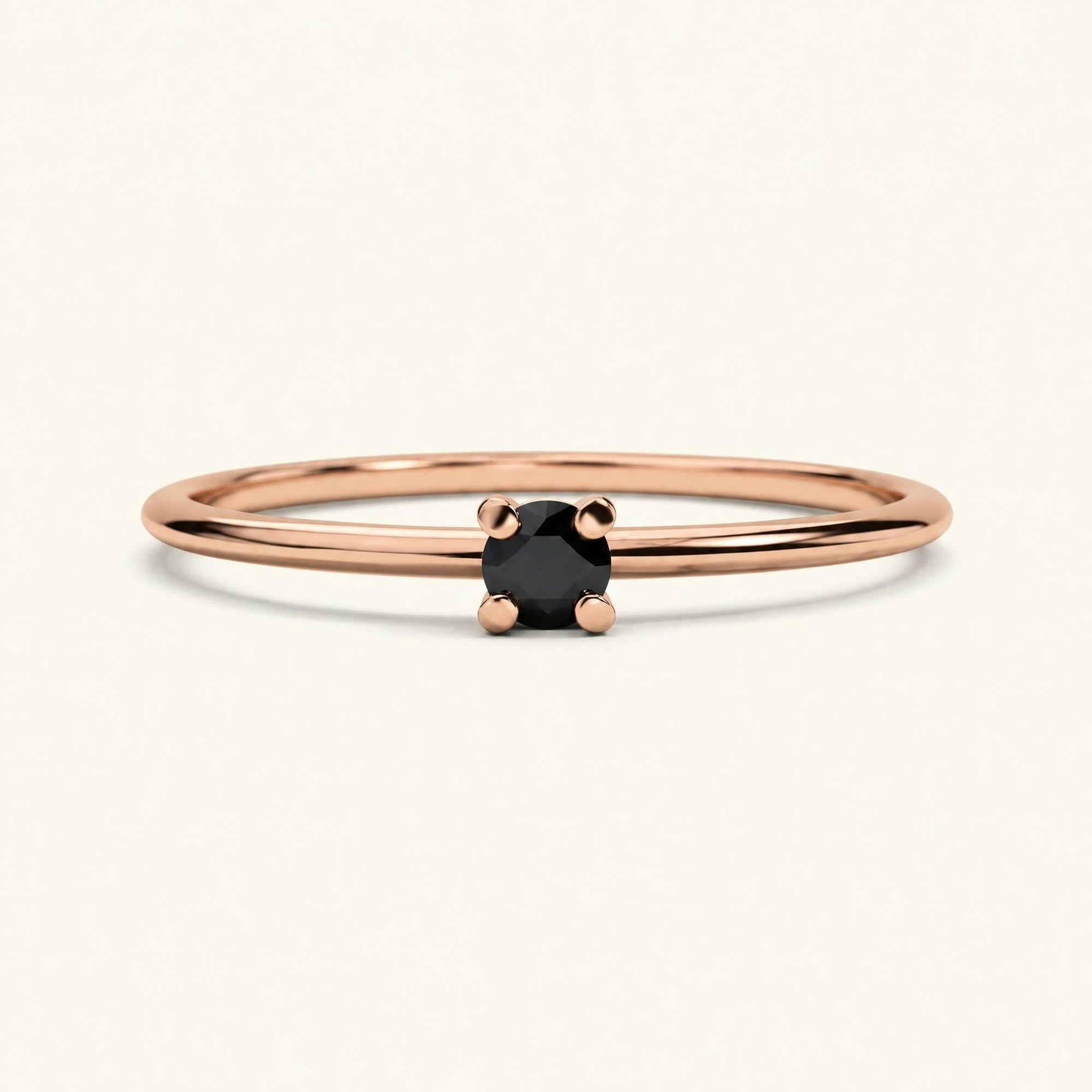 Bague solitaire diamant noir en or rose 18cts
