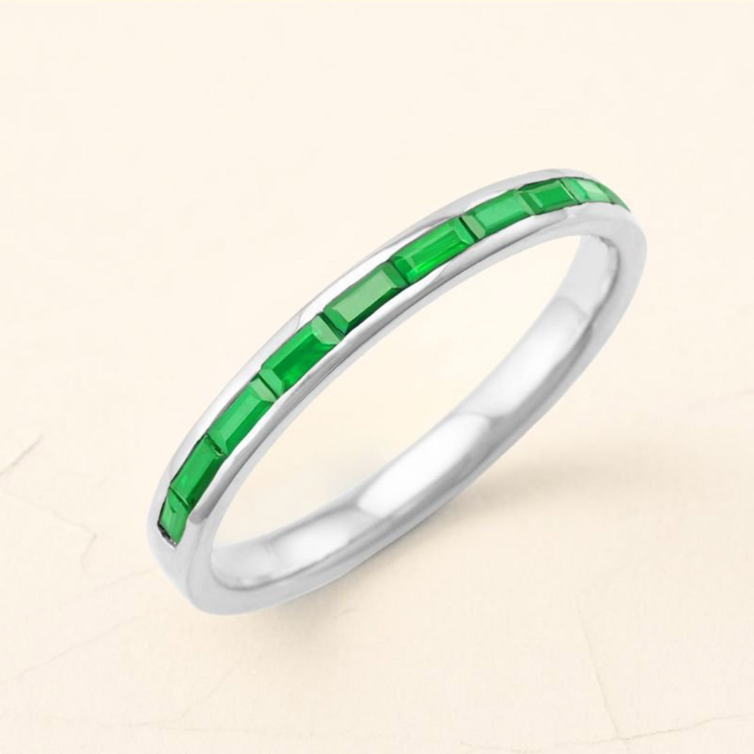 Bague en emeraude taille baguette pour homme or blanc 18 carats