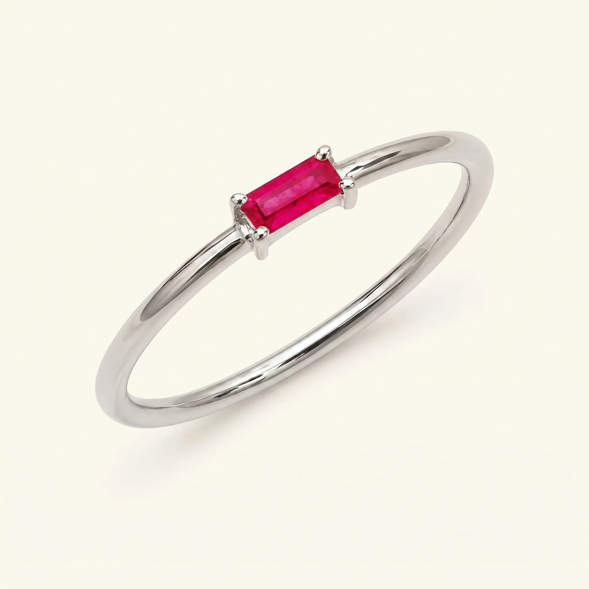 Anillo solitario rubí oro blanco talla baguette