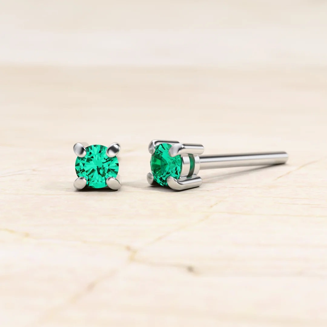 Pendientes solitario esmeralda en oro blanco Saral