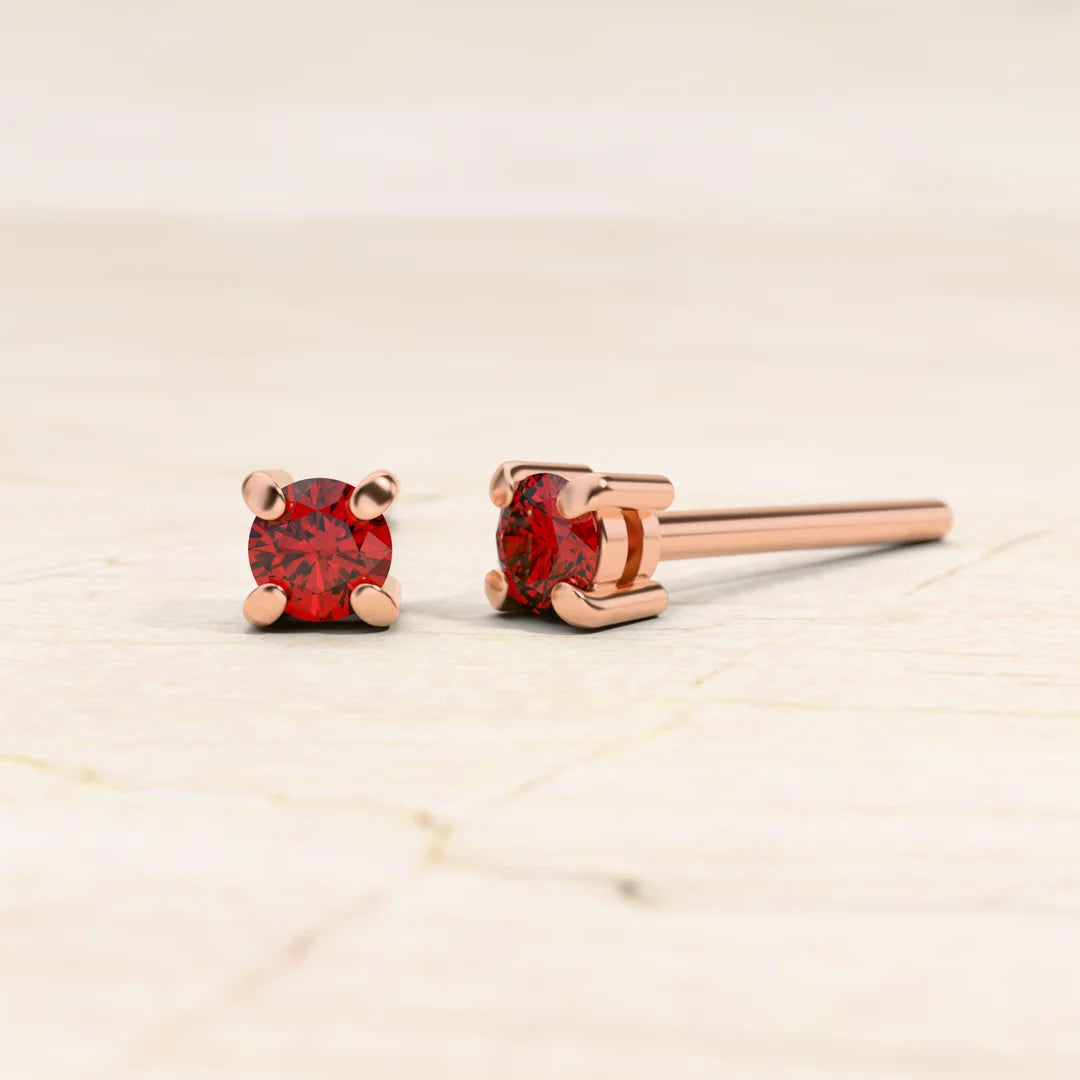 Pendientes solitario rubí en oro rosa 18 quilates