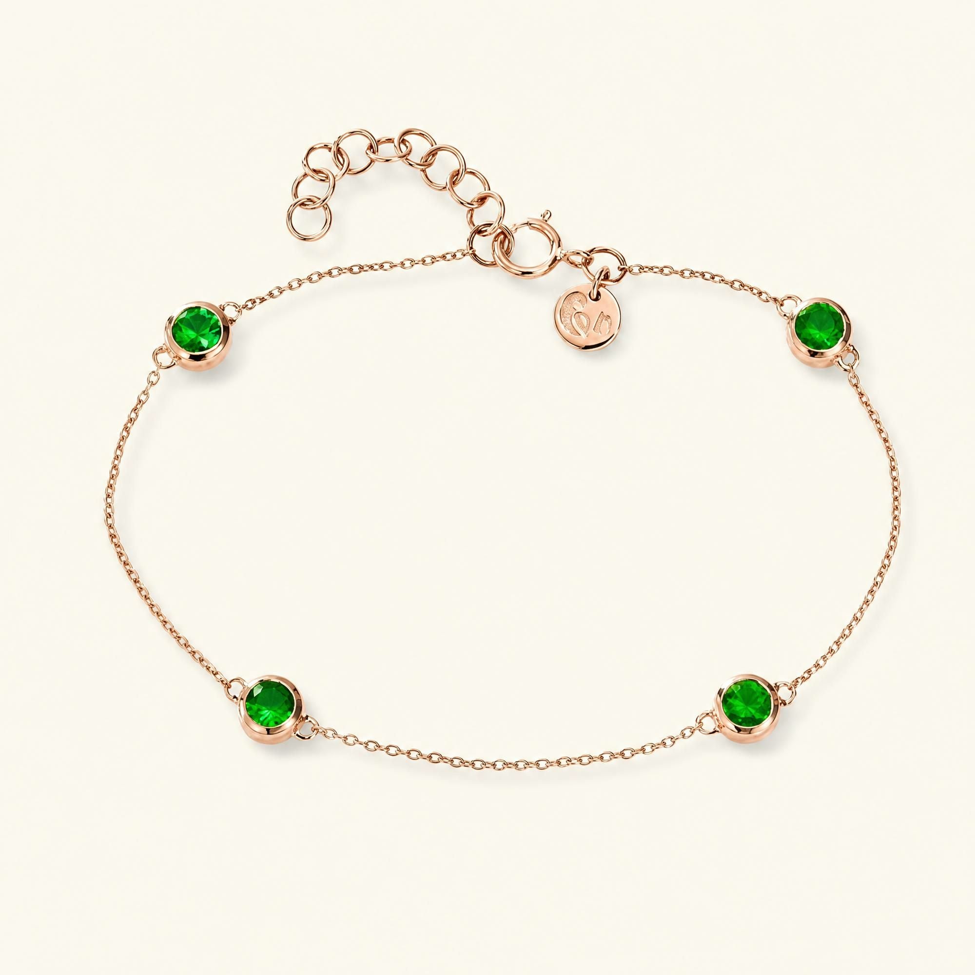 Pulsera Dhanya esmeralda en oro rosa