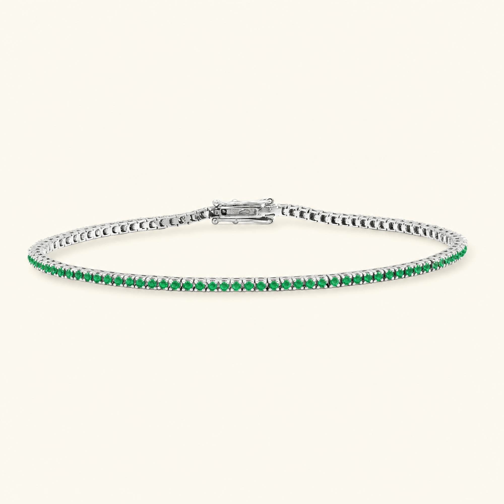 Pulsera de tenis rivière esmeralda oro blanco 18 quilates