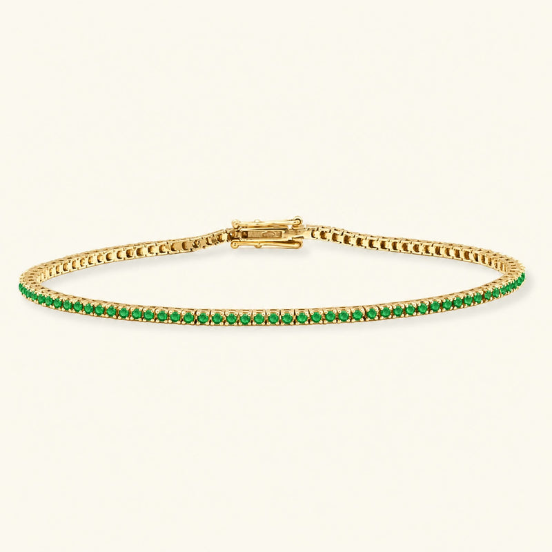 Pulsera de tenis rivière esmeralda oro amarillo 18 quilates
