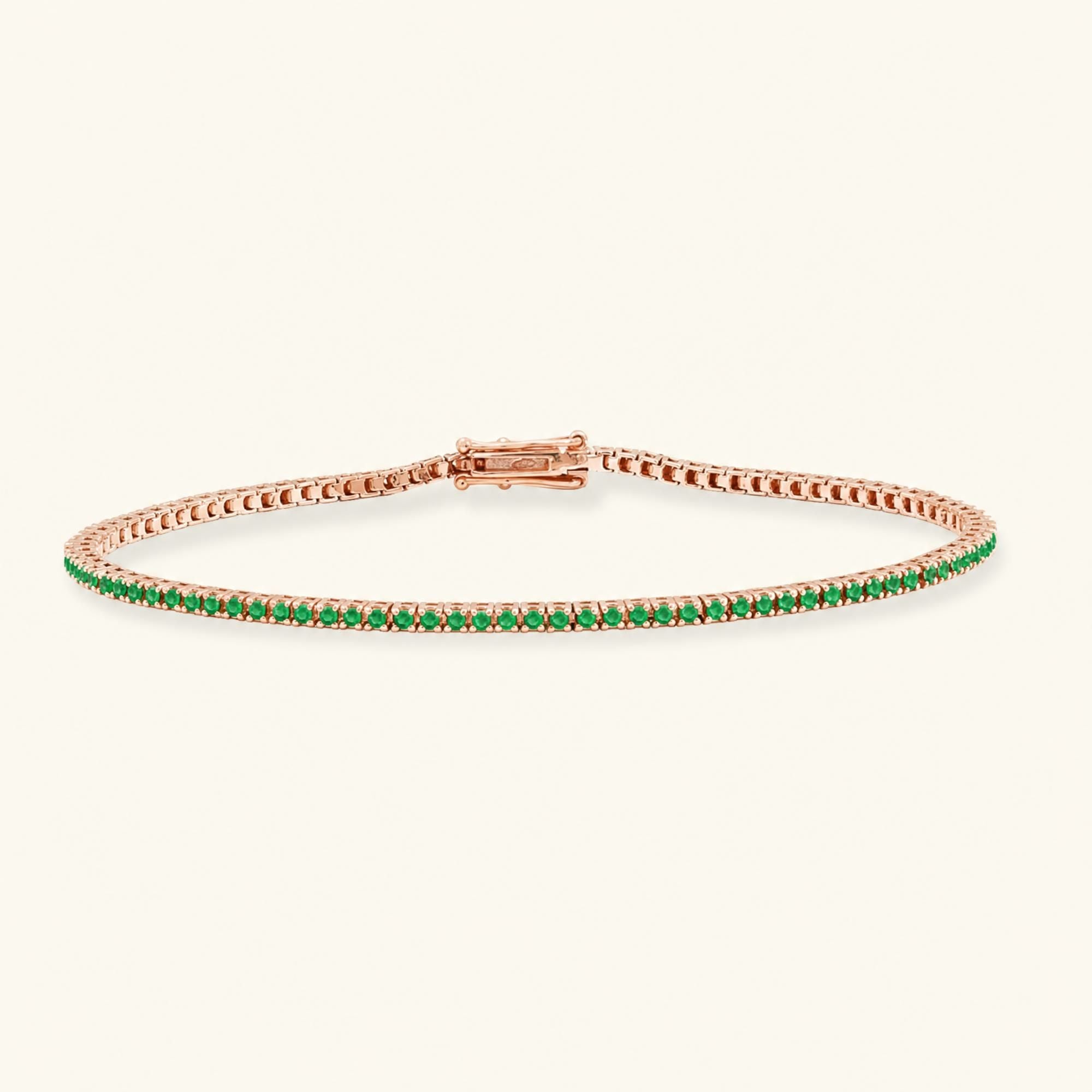 Pulsera de tenis rivière esmeralda oro rosa 18 quilates