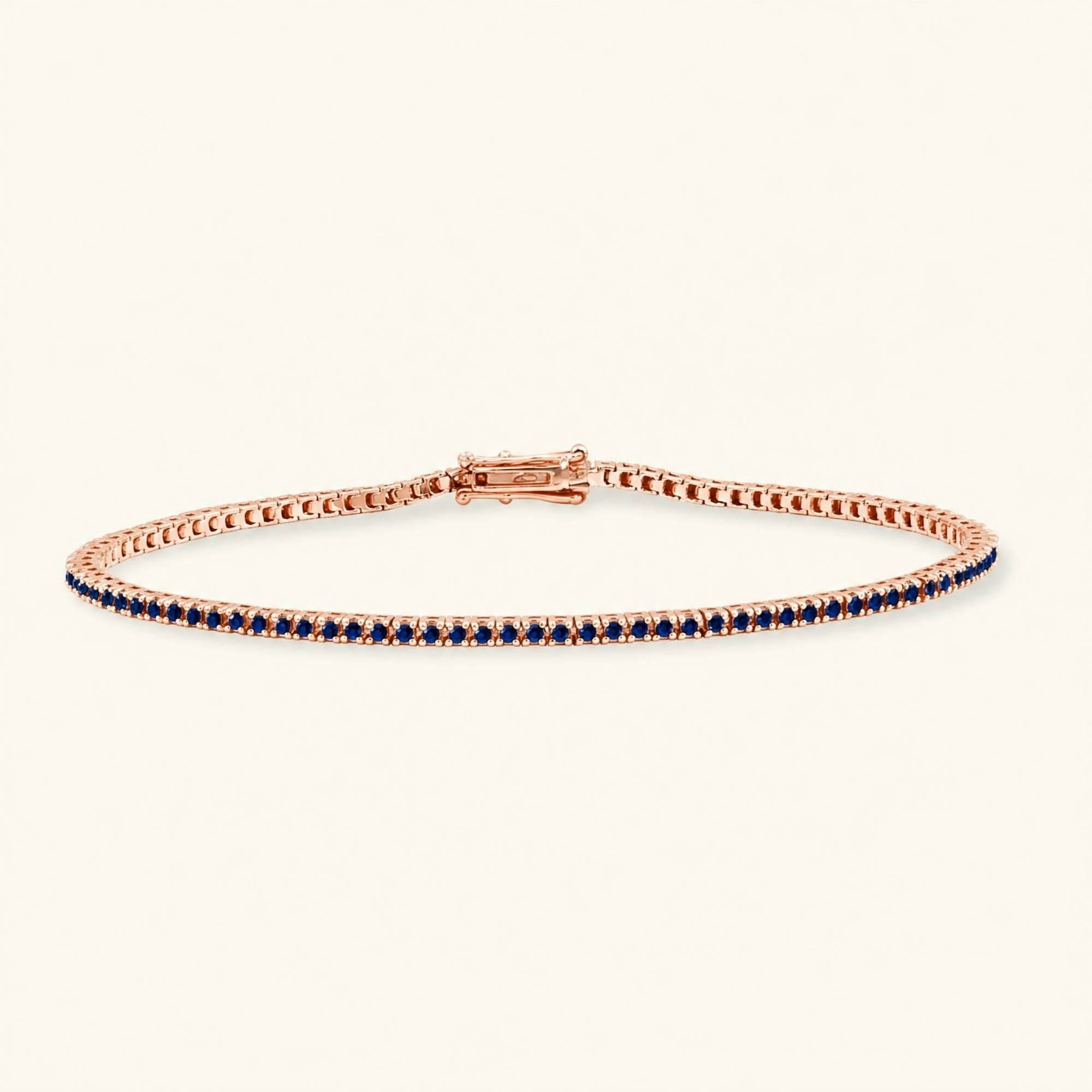 Pulsera de tenis rivière zafiro oro rosa 18 quilates