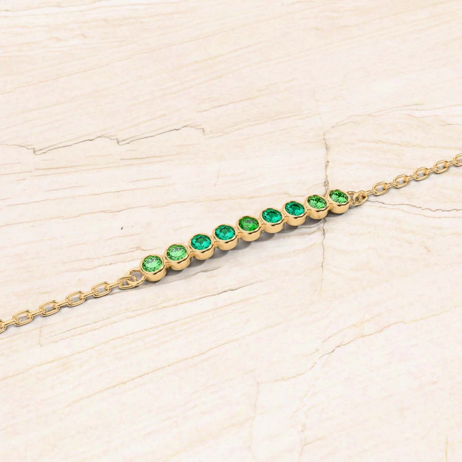 Pulsera de esmeraldas para mujer, en oro blanco o amarillo.