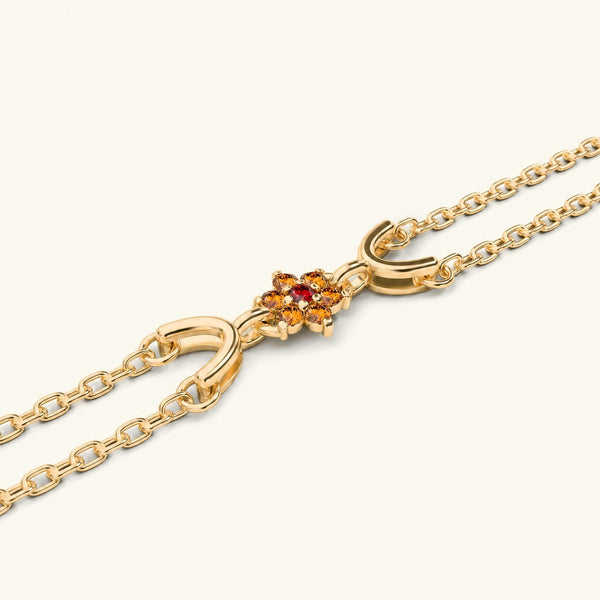 Pulsera Surya de oro amarillo para mujer con zafiro naranja