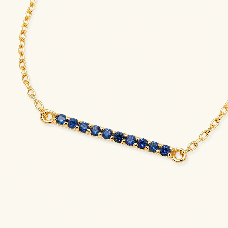 Pulsera barra larga rubí en oro amarillo