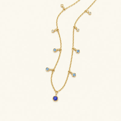 Collar Megha de oro amarillo con zafiro