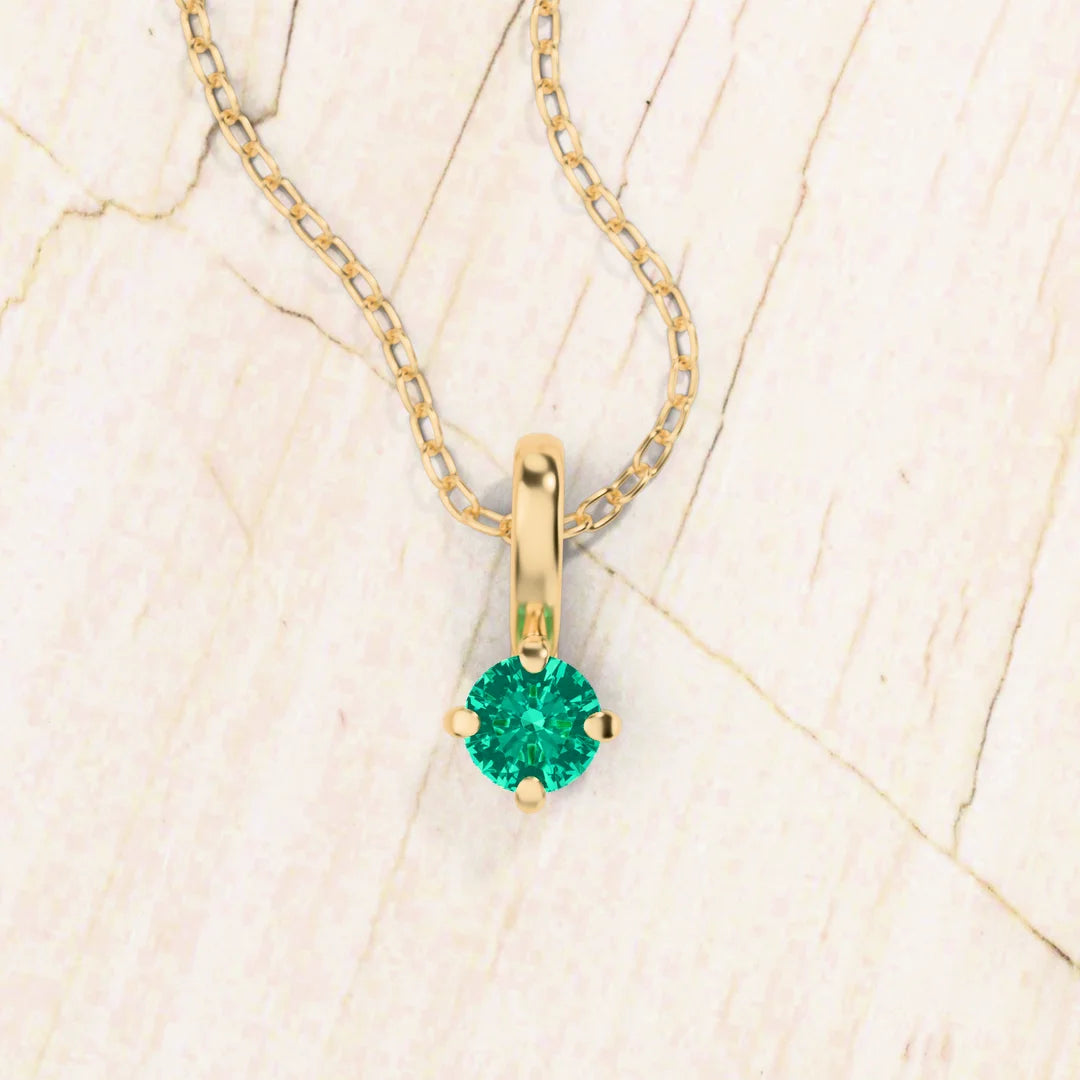 Collar solitario esmeralda oro amarillo Saral