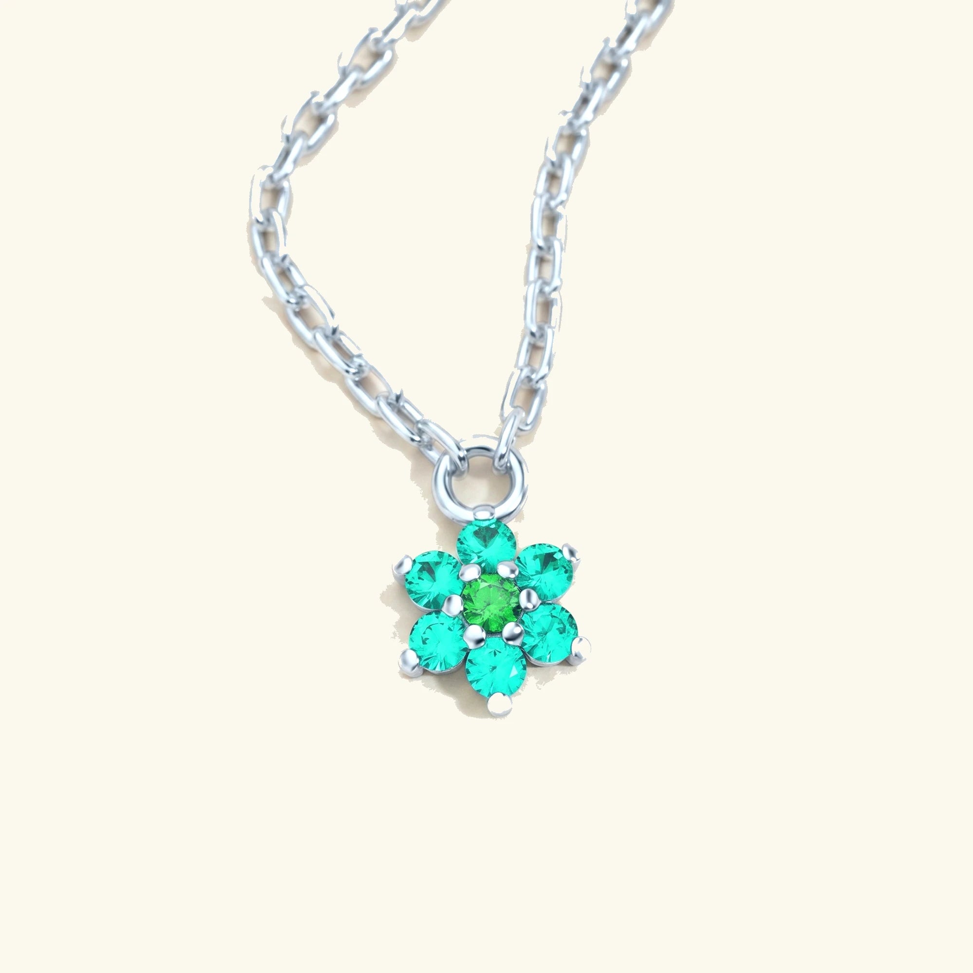 Collar Surya de oro blanco con esmeralda