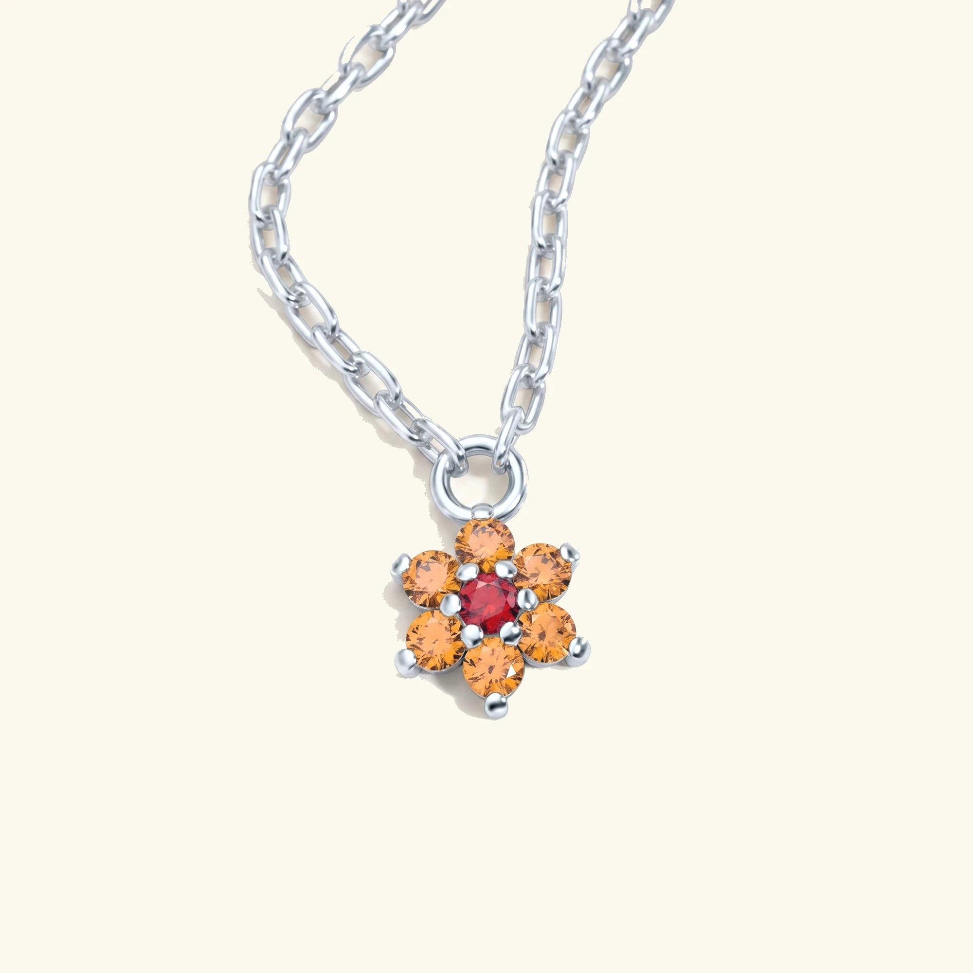 Collar Surya de oro blanco con zafiro naranja