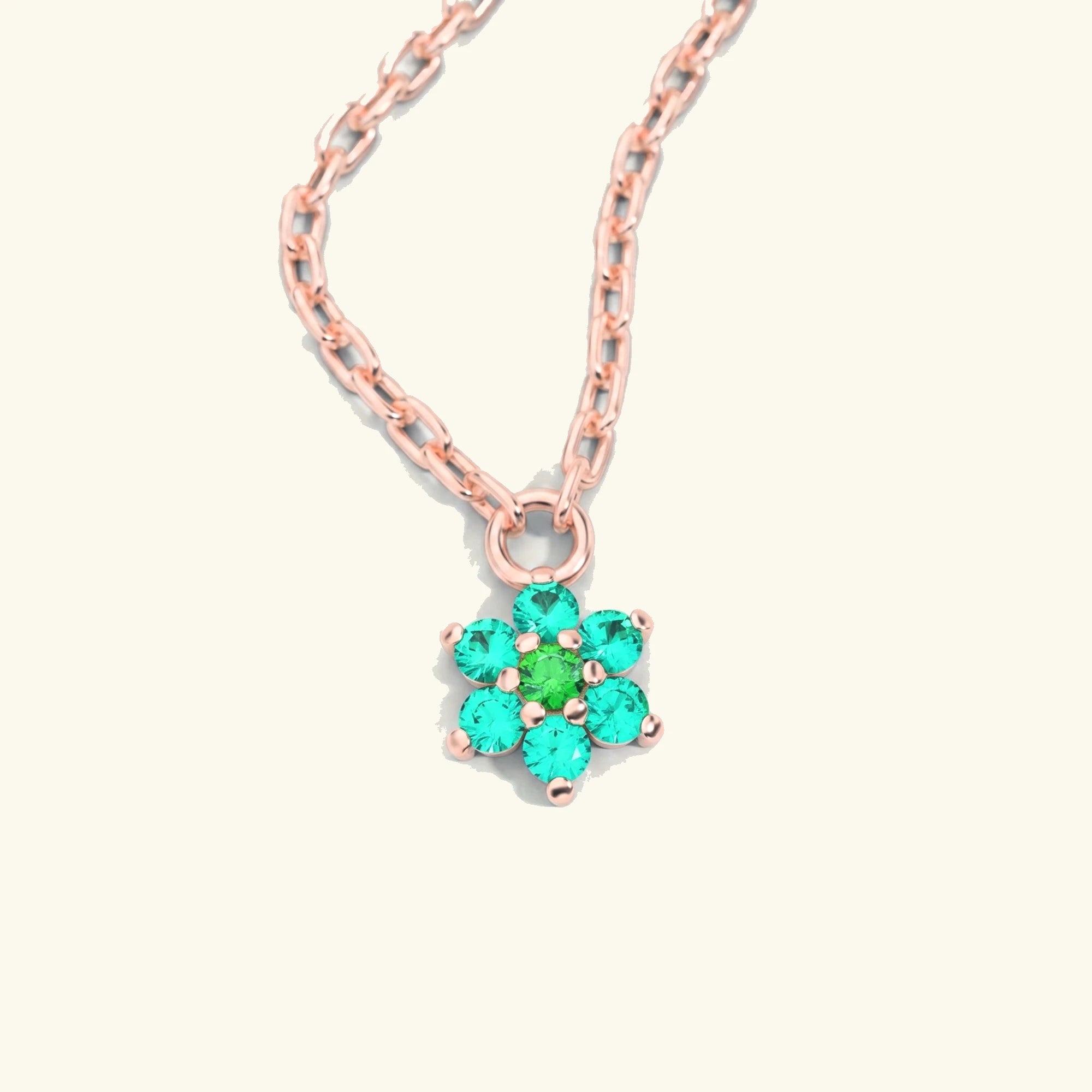 Collar Surya de oro rosa con esmeralda