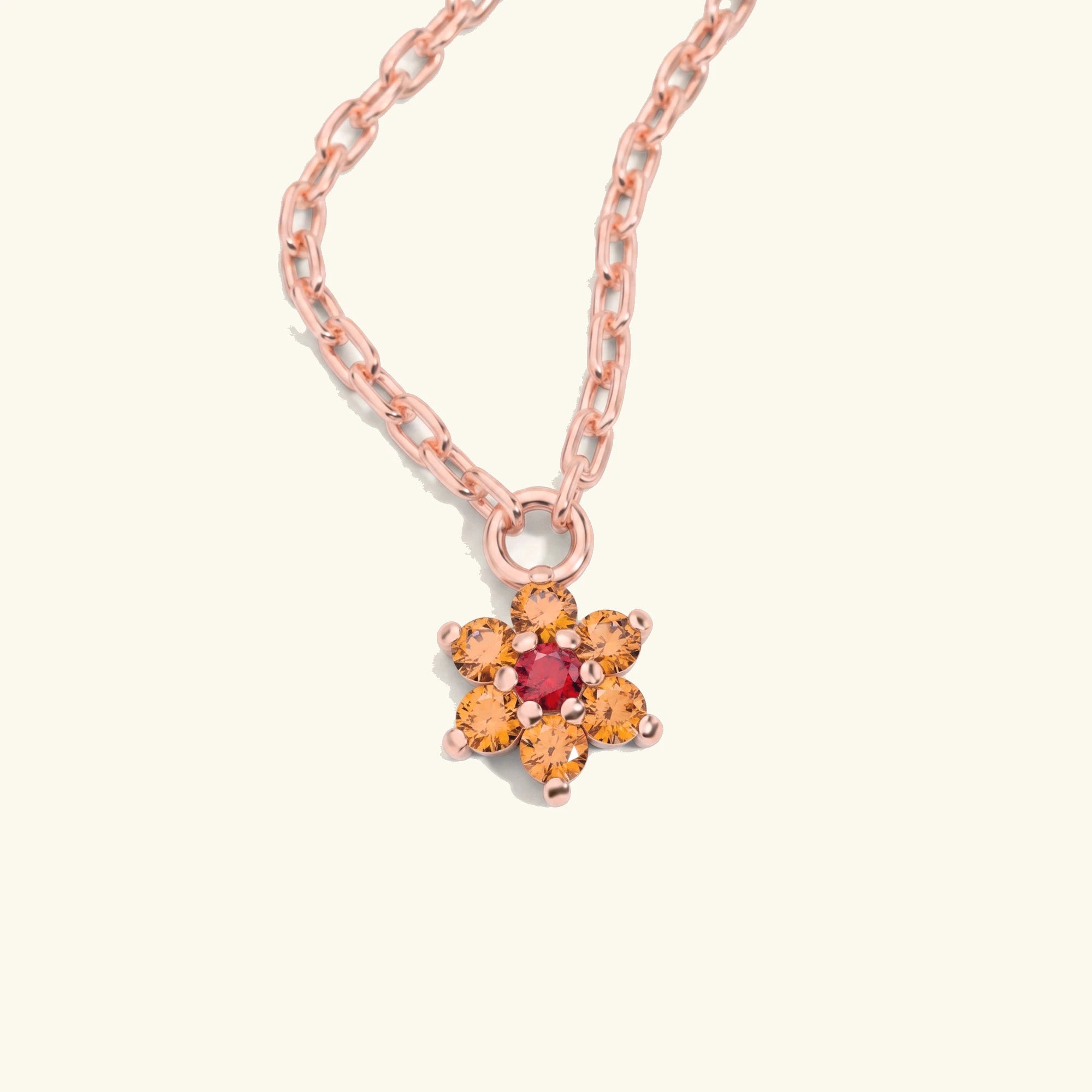 Collar Surya de oro rosa con zafiro naranja