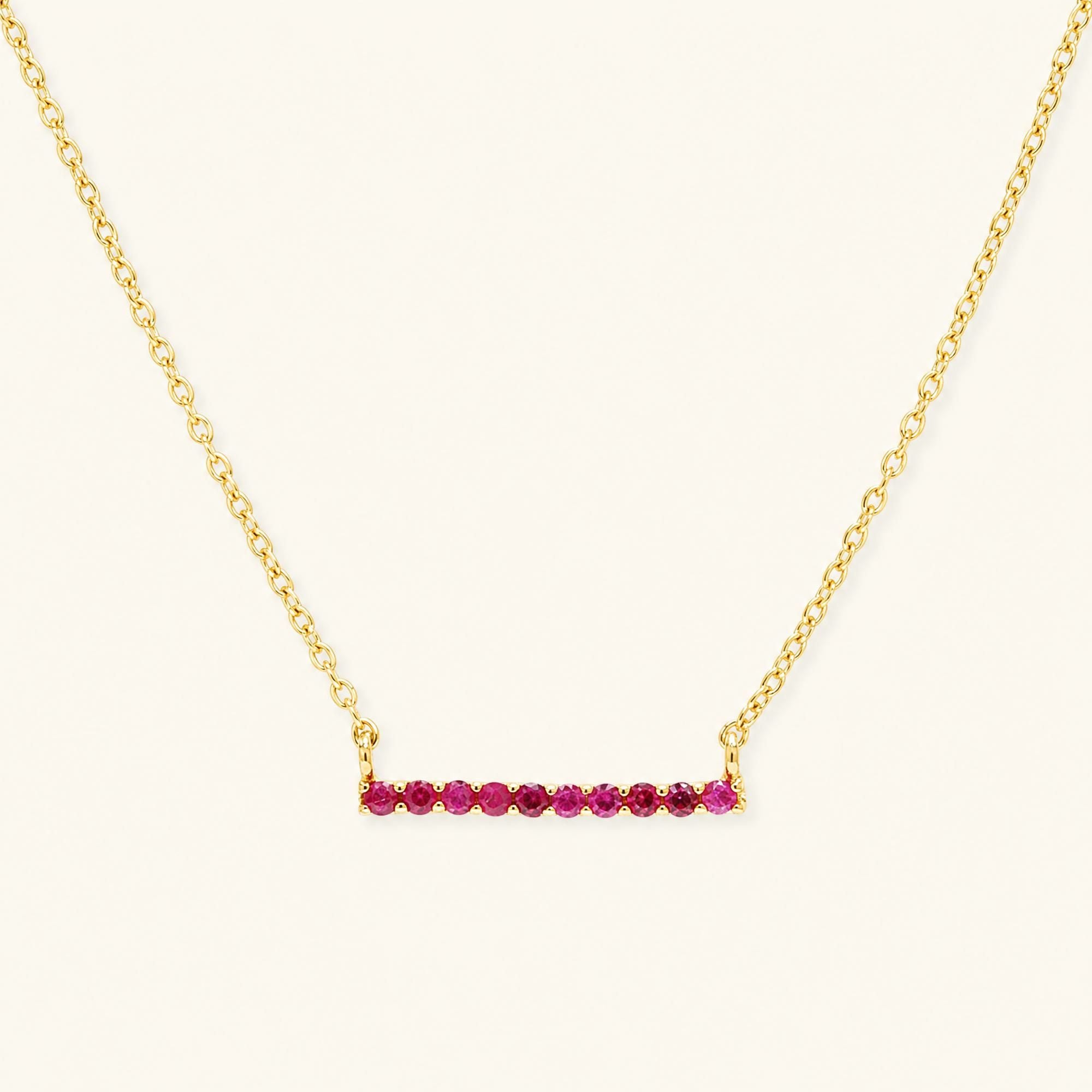 Collar barra Ujala rubí - oro amarillo