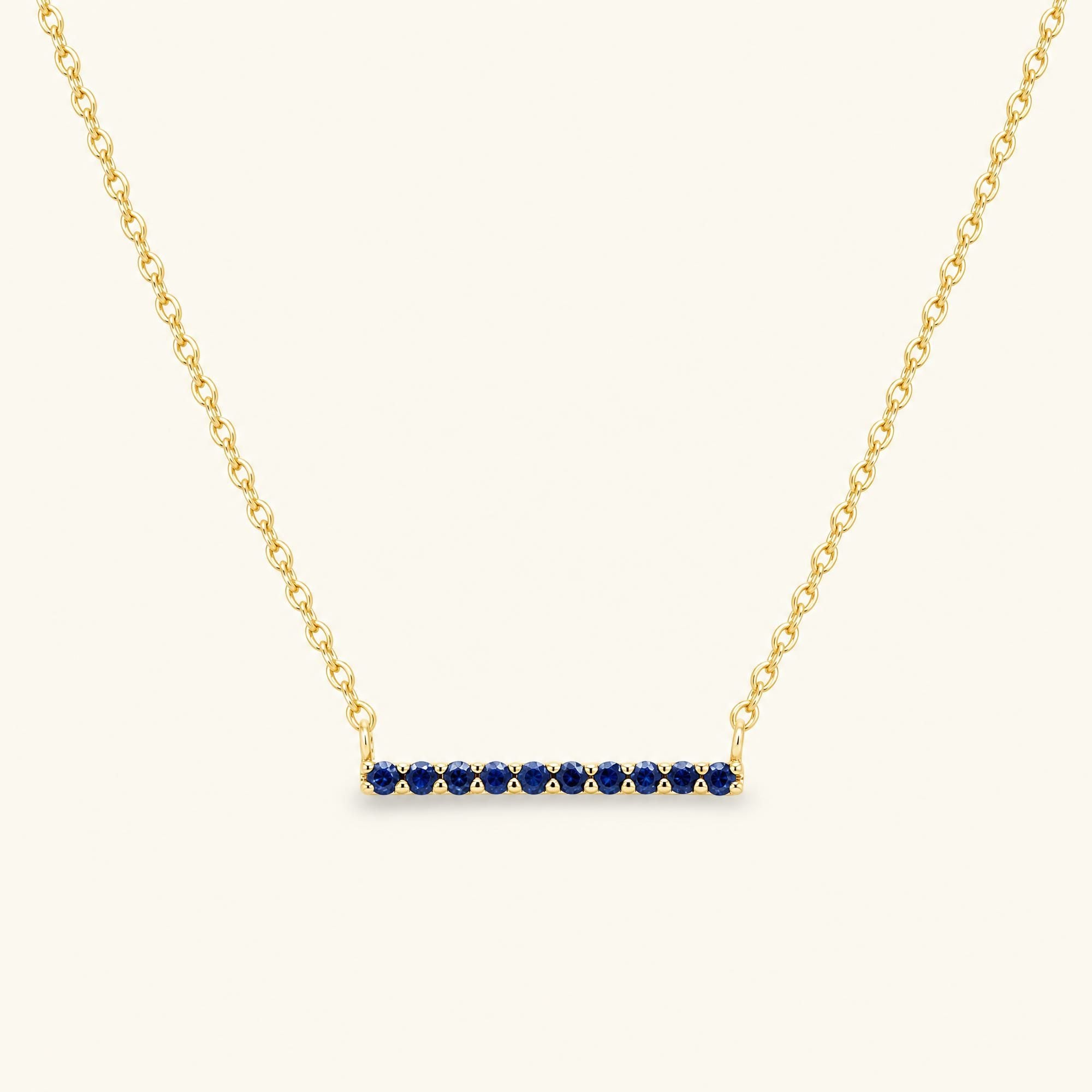 Collar barra Ujala zafiro - oro amarillo